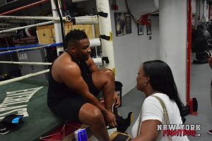 Big Baby discussing some business with his head of PR, Alvina Alston of More Media LLC