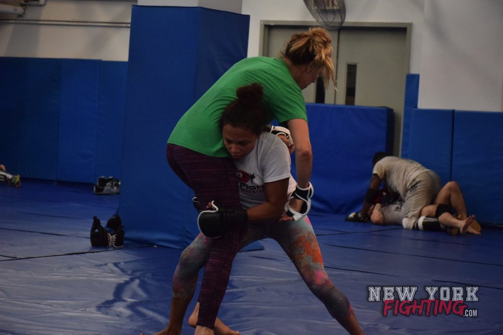 Jamie and training partner UFC fight Katlyn Chookagian drilling takedowns 