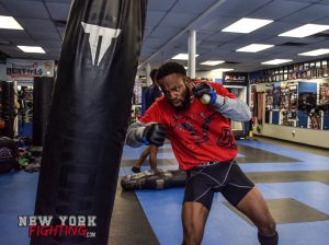 Andre working his hands on the bag during an MMA circuit